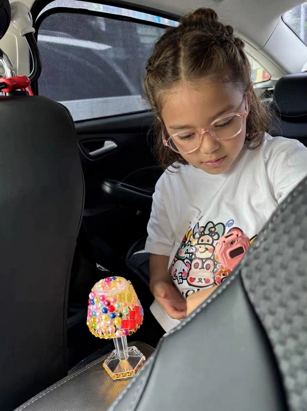A child wearing EyeBuddy glasses on an everyday adventure