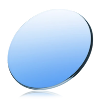 Blue tinted sunglasses lens with dark rim, close-up