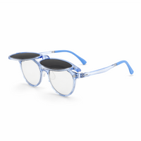 Transparent blue 2-in-1 eyeglasses with black oval lenses and blue curved temples