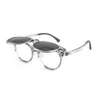 2-in-1 eyeglasses with clear frame and dark wraparound lenses