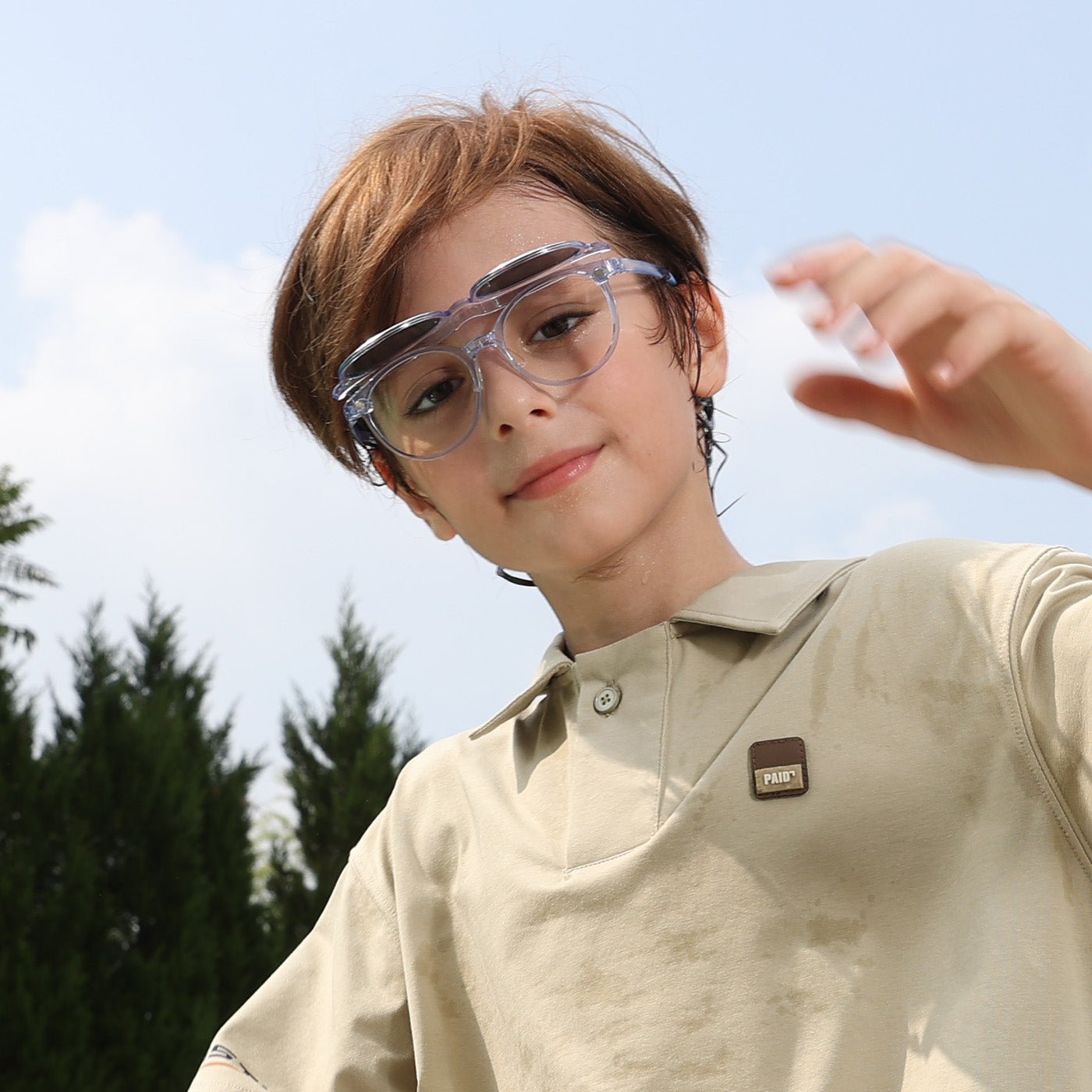 Kids 2-in-1 sunglasses with clear/pink frames and dark lenses