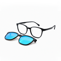 Black 2-in-1 glasses with blue clip lenses and clear eyeglass frame