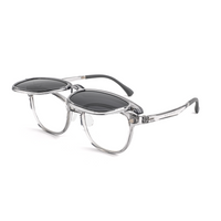 Transparent 2-in-1 glasses with dark-tinted sunglasses lenses and clear frame