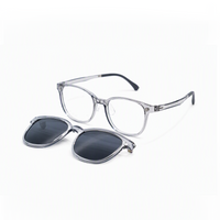 Transparent 2-in-1 glasses with clear eyeglass frame and dark clip lenses