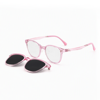 2-in-1 pink translucent eyeglasses with clear front and black clip-on lenses