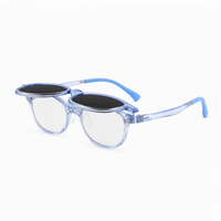 2-in-1 kids eyeglasses, transparent blue frame with dark lenses and clear lenses