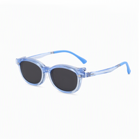 2-in-1 kids eyeglasses, transparent blue frame with dark blue-tinted lenses