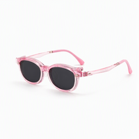 Archie 2-in-1 clip-on sunglasses, transparent pink frame with black lenses