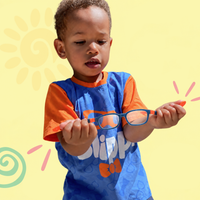 Kids blue eyeglass frames with orange temples and clear lenses