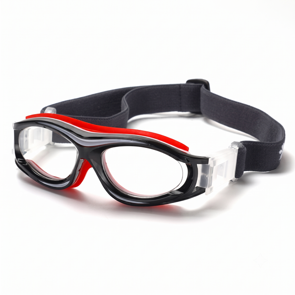 Soren safety goggles with black frame, clear lenses, and red side accents