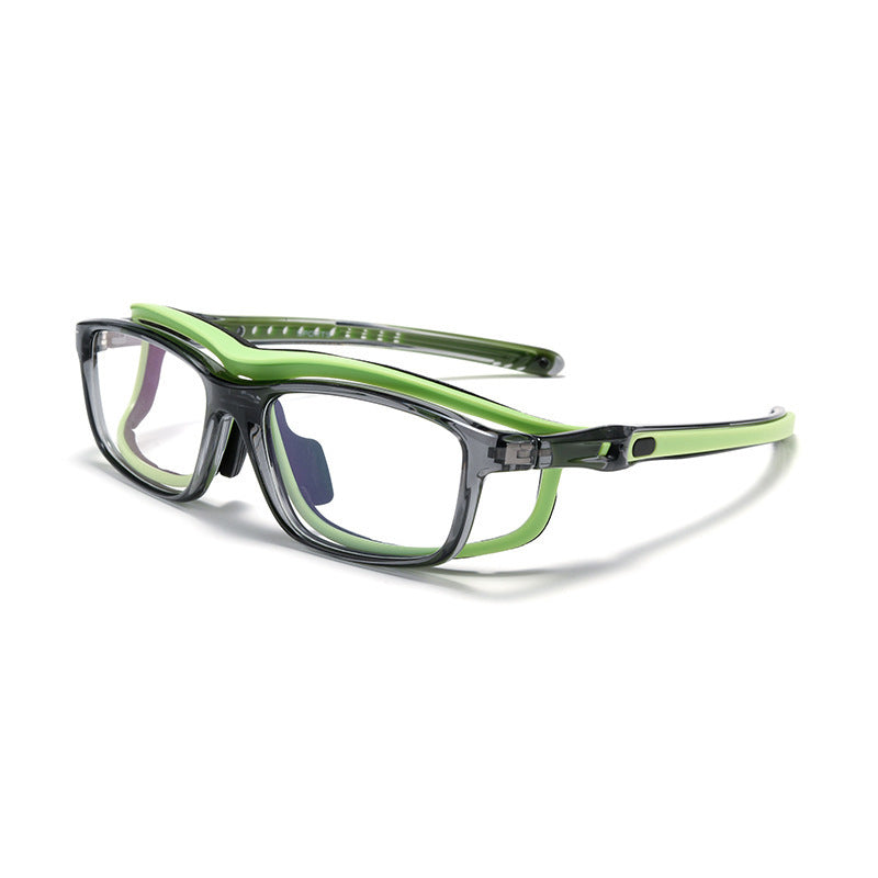 Green and black safety glasses in side view with clear lenses and adjustable hinge.
