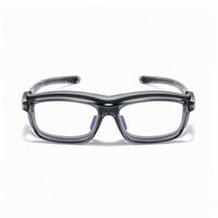 Black and clear safety glasses with white-tinted lenses and wraparound frame.