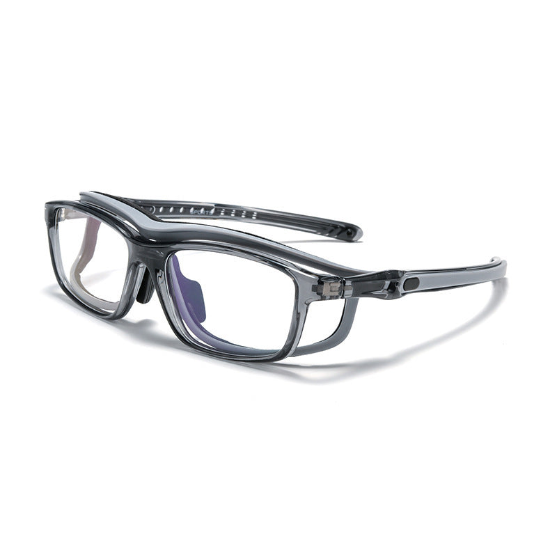 Black and clear safety glasses from the side with clear lenses and curved arms.