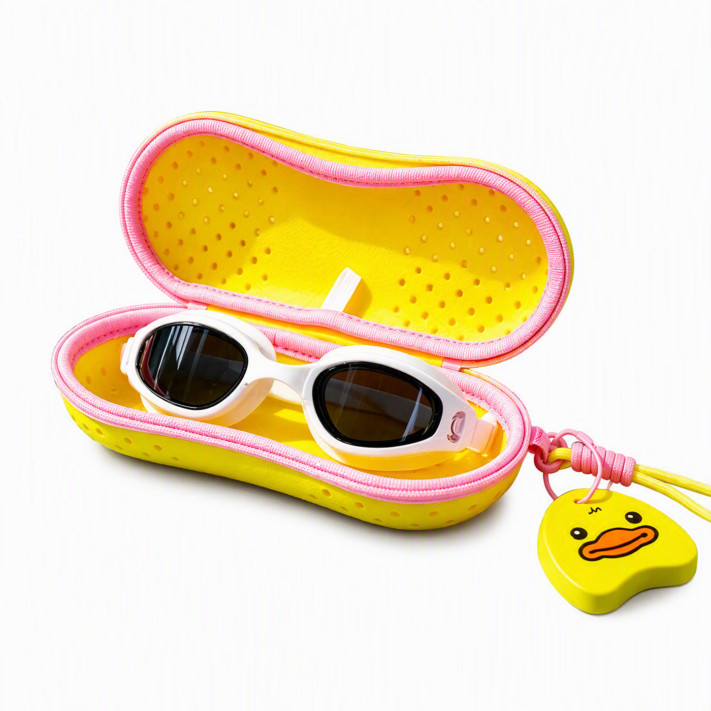 Opened yellow swim pouch with goggles inside and duck keychain charm