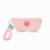 Pink pencil case with light pink zipper and owl-style patch; pink tassel keychain