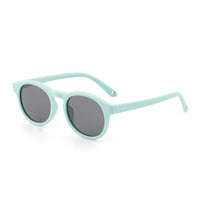 Round sunglasses with mint green frame and dark lenses, side view