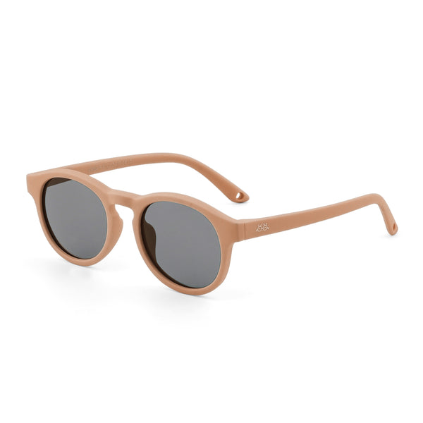 Round sunglasses with light brown frame and dark lenses, side view