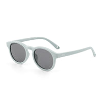 Sunglasses with pale aqua frames and dark tinted round lenses