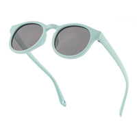 Light green kids sunglasses angled view with dark lenses and curved temples