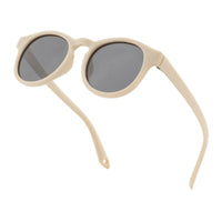 Oval sunglasses with light beige frame, angled side arms, dark lenses