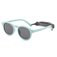 Round sunglasses with mint green frame, dark lenses, and gray head strap